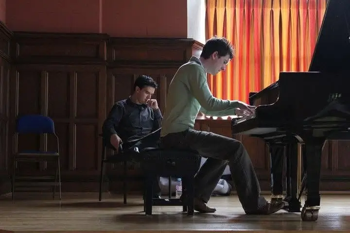 Rory Dowse playing for Cathal Breslin in a masterclass at the Walled City Music Festival in 2011