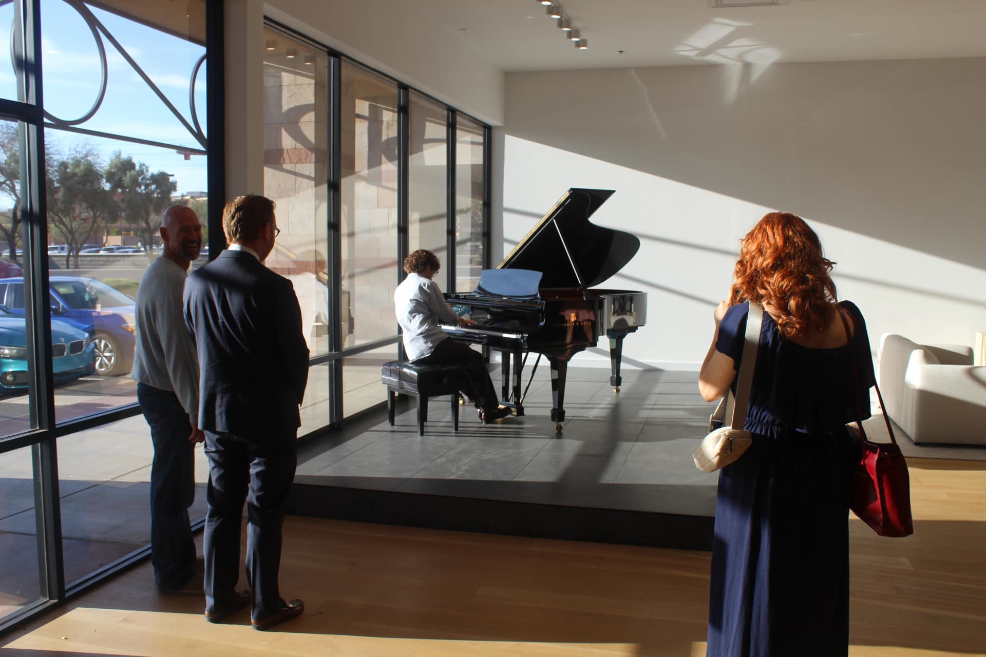 A young pianist playing Chopin's Ballade No. 1 at Steinway Gallery, Scottsdale.