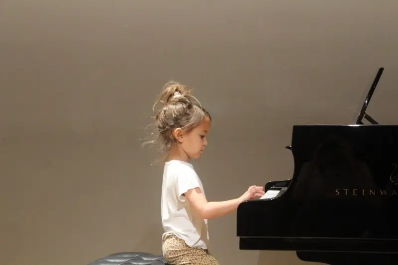 Five-year-old Mia performing at Steinway Hall